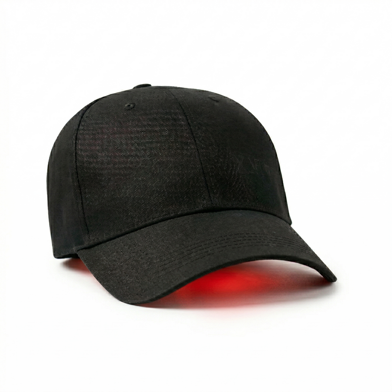 Exoh red light therapy cap worn on the head